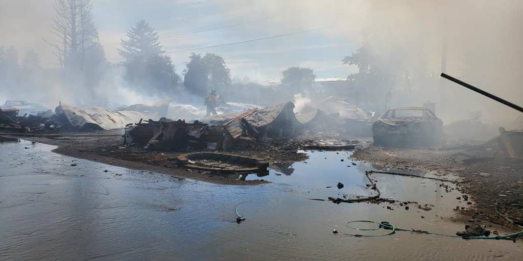 2 dead after brush fire rips through mobile home community in ...