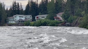 See Alaska's raging Mendenhall River erode riverbank prompting evacuations as buildings, trees get swept away