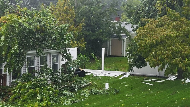 Tony Santos captured storm damage Friday in Brockton, Massasschuttes.