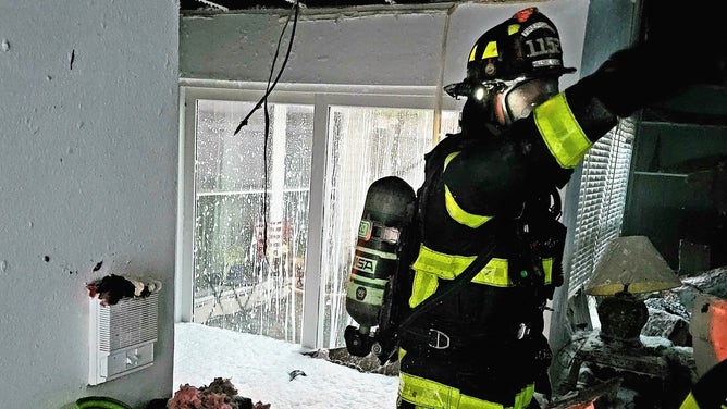 Firefighters respond to fire cause by lightning strike.