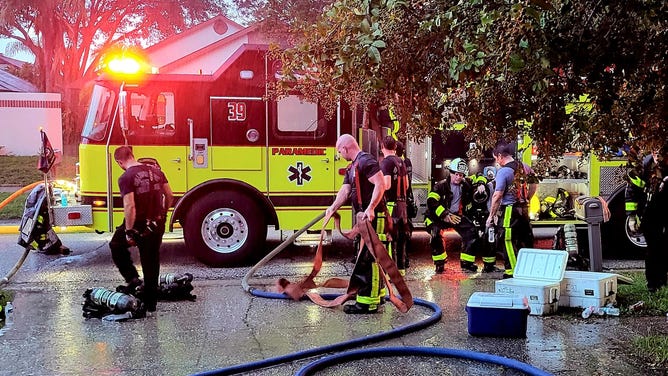 Firefighters respond to fire cause by lightning strike.