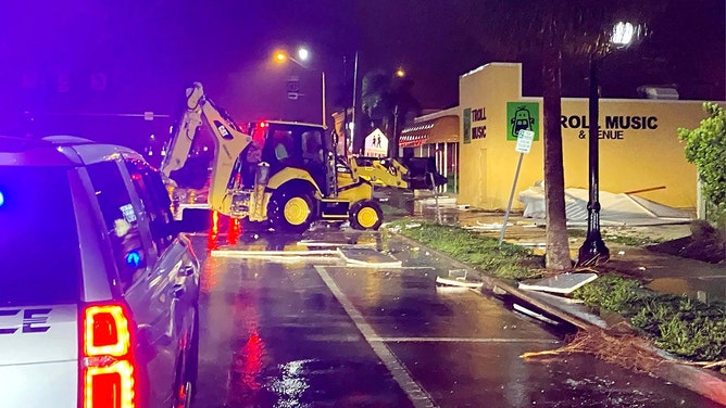 The roadway was cleared outside Troll Music in Venice, Florida, on Wednesday morning as Hurricane Idalia moved onshore.