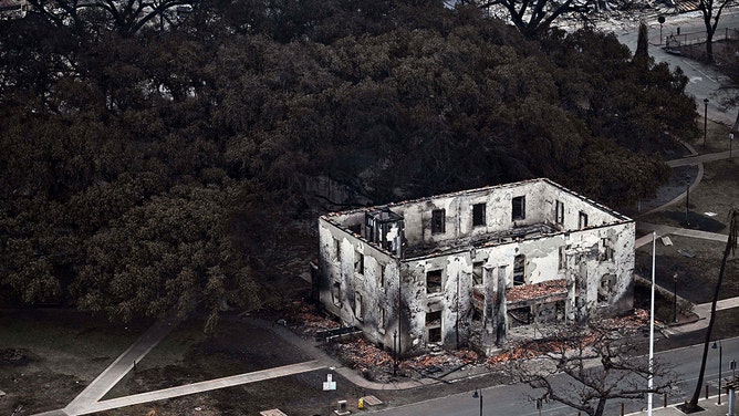 An aerial image shows a burned building in the historic Lahaina in the aftermath of wildfires in western Maui in Lahaina, Hawaii, on August 10, 2023.