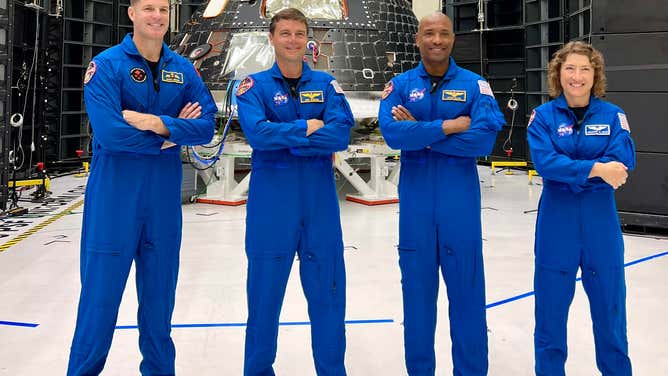 The Artemis II astronaut crew in front of the Orion spacecraft at Kennedy Space Center in Florida on Aug. 8, 2023. From left to right: CSA astronaut Jeremy Hansen and NASA astronauts Reid Wiseman, Victor Glover and Christian Hammock Koch.