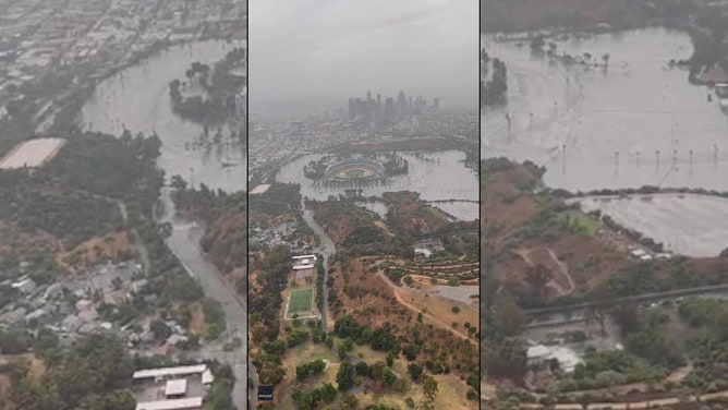 A video taken on Sunday shows Dodger Stadium appearing flooded with a moat-like reflection from the wet asphalt.A video taken on Sunday shows Dodger Stadium appearing flooded with a moat-like reflection from the wet asphalt.