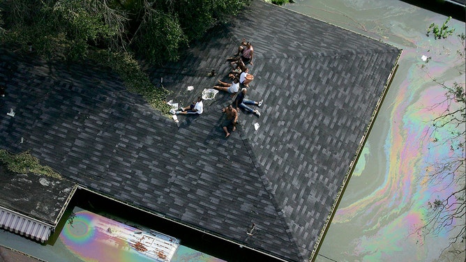 People are stranded connected  a extortion   owed  to flood waters from Hurricane Katrina connected  August 30, 2005, successful  New Orleans, Louisiana.