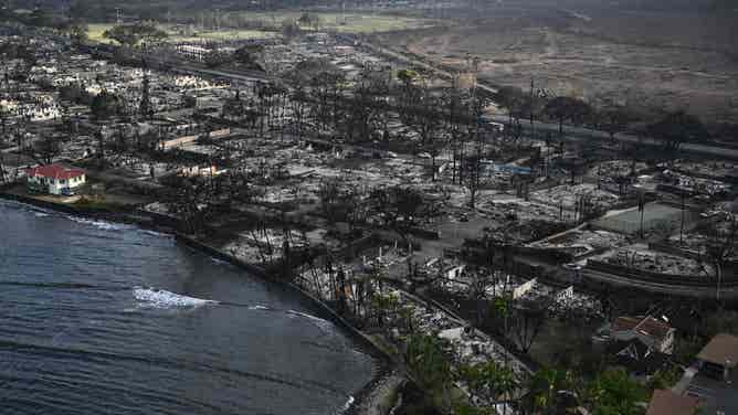 An aerial view of Lahaina after wildfires burned through the town on the Hawaiian island of Maui, on August 10, 2023. At least 36 people have died after a fast-moving wildfire turned Lahaina to ashes, officials said August 9, as visitors asked to leave the island of Maui found themselves stranded at the airport. The fires began burning early August 8, scorching thousands of acres and putting homes, businesses and 35,000 lives at risk on Maui, the Hawaii Emergency Management Agency said in a statement. (Photo by Patrick T. Fallon / AFP) (Photo by PATRICK T. FALLON/AFP via Getty Images)