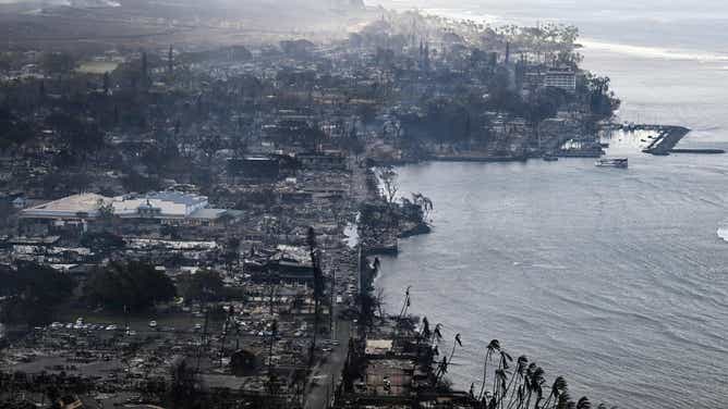 An aerial view shows destroyed homes and buildings that burned to the ground around the harbor and Front Street in the historic Lahaina Town in the aftermath of wildfires in western Maui in Lahaina, Hawaii, on August 10, 2023. At least 36 people have died after a fast-moving wildfire turned Lahaina to ashes, officials said August 9, as visitors asked to leave the island of Maui found themselves stranded at the airport. The fires began burning early August 8, scorching thousands of acres and putting homes, businesses and 35,000 lives at risk on Maui, the Hawaii Emergency Management Agency said in a statement. (Photo by Patrick T. Fallon / AFP) (Photo by PATRICK T. FALLON/AFP via Getty Images)