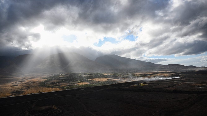 An aerial image shows a burned hillside above Lahaina in the aftermath of wildfires in western Maui in Lahaina, Hawaii, on August 10, 2023.