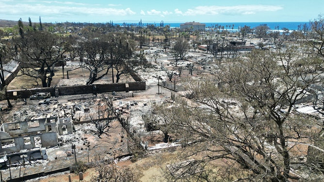 This aerial photo shows destroyed buildings and homes in the aftermath of a wildfire in Lahaina, western Maui, Hawaii on August 11, 2023.