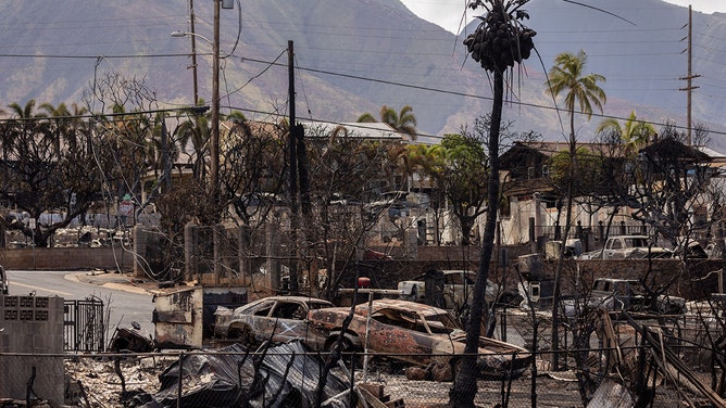 Destroyed buildings and cars are seen in the aftermath of the Maui wildfires in Lahaina, Hawaii on August 16, 2023.