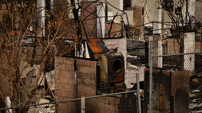 The remains of a washer-dryer are seen in the aftermath of the Maui wildfires in Lahaina, Hawaii, on August 16, 2023.