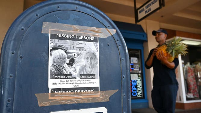 NAPILI, HI- AUGUST 17: A missing persons sign is taped to a mailbox at Napili Plaza on Thursday August 17, 2023 in Napili, HI. The death toll continues to rise for the fires on Maui. (Photo by Matt McClain/The Washington Post via Getty Images)