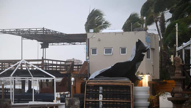 Picture taken at Medano beach as rain and gusts of wind of Hurricane Hilary reach Cabo San Lucas, Baja California State, Mexico, on August 19, 2023. Mexico prepared Friday for a powerful Pacific hurricane that triggered a warning of "potentially catastrophic" flooding in a northwestern tourist region and the neighbouring US state of California. Hurricane Hilary threatened to bring strong winds, flash floods and "life-threatening" surf and rip current conditions, the US National Hurricane Center (NHC) said.