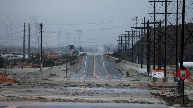 A road is washed out as Tropical Storm Hilary heads north into Palm Springs, California, on August 20, 2023.