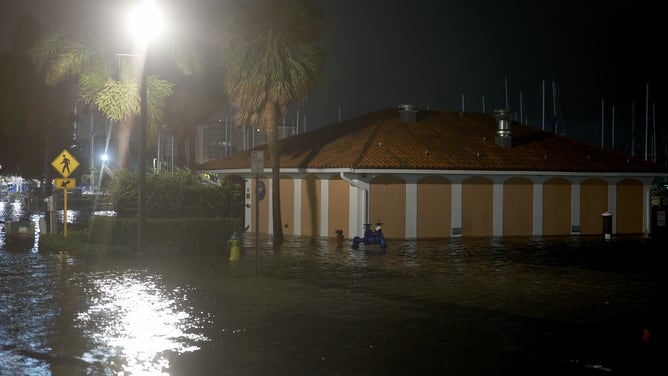 ST PETERSBURG, FLORIDA - AUGUST 30: Flood waters caused by Hurricane Idalia passing offshore surround a building on August 30, 2023 in St. Petersburg, Florida. Hurricane Idalia is hitting the Big Bend area of Florida.