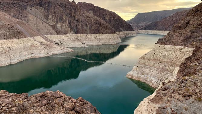 "Bathtub rings" indicate the water level deficit at Lake Mead.