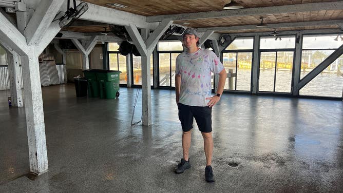 Jordan Keaton stands inside his restaurant.