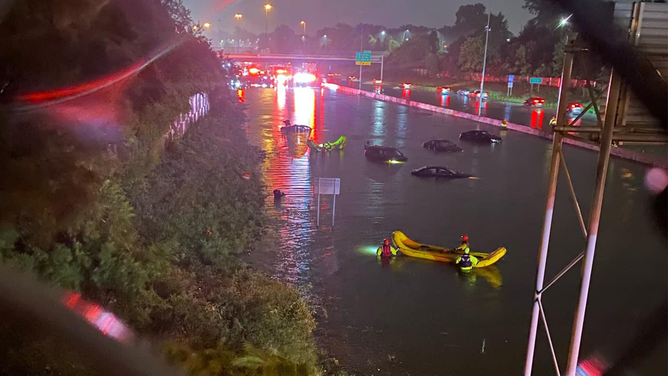 Several cars are seen submerged in floodwaters on Interstate 90 in Lakewood, Ohio.