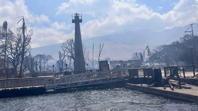 A charred dock near Lahaina in Maui where U.S. National Guard Hawaii Pacific crews continue rescue operations from fires in Hawaii on Aug. 10, 2023. (