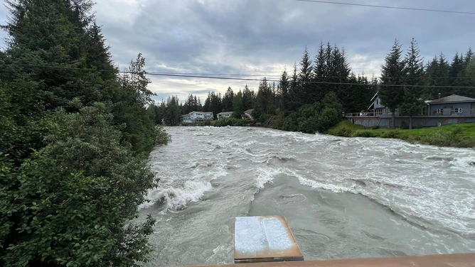 Water is seen rushing down the Mendenhall River in Alaska on Saturday, August 5, 2023.