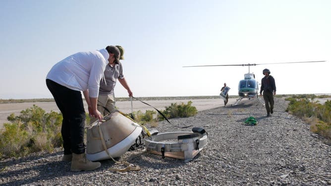 On Aug. 30, 2023, the OSIRIS-REx team held their final rehearsal before a sample of asteroid Bennu lands on Earth on Sept. 24. Pictured here are capsule recovery team members of from OSIRIS-REx and from the military packing up a mock capsule.