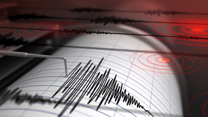 An earthquake demonstrated on a seismograph.