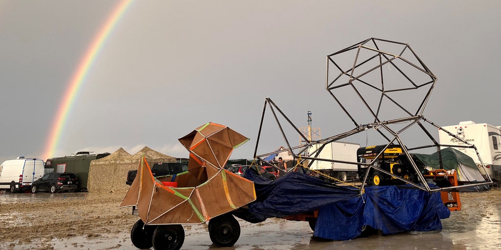 Burning Man attendees begin exodus of festival after being trapped by