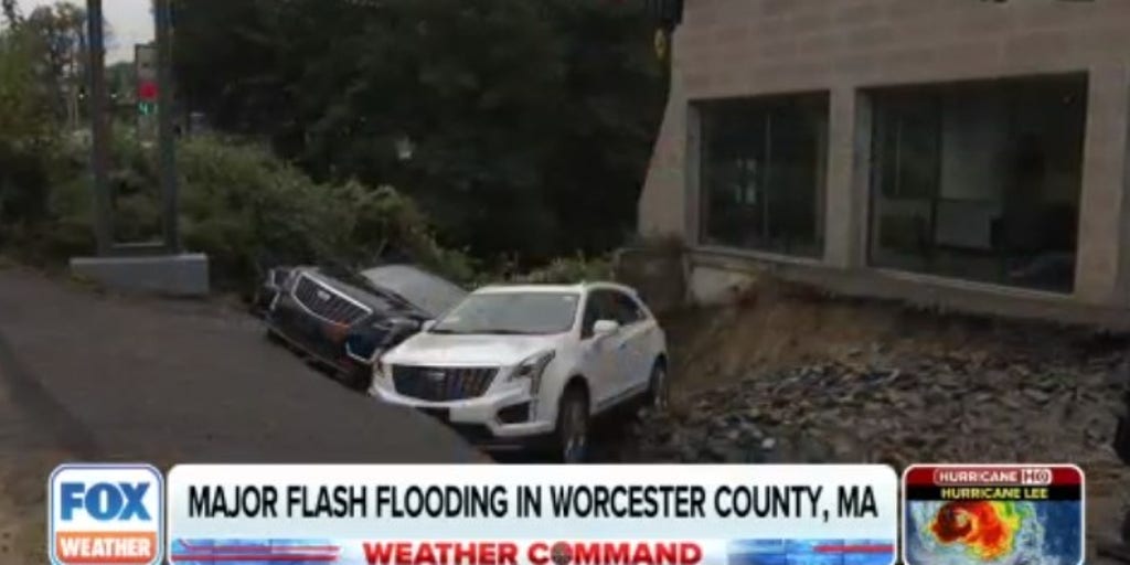 Sinkhole swallows 3 Cadillacs at Massachusetts dealership during flash flooding