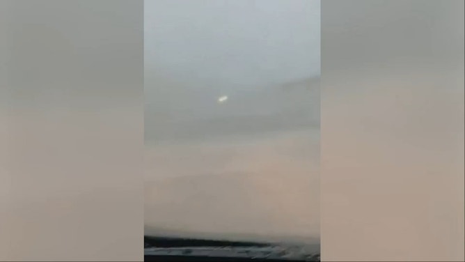 A still from the video Kayla Norris recorded while she and husband Sam were driving through Ophelia.