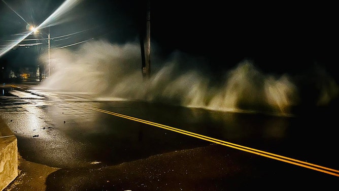 High tide came at 12:31 a.m. Saturday and Wells, Massachusetts police said, and the waves were high.