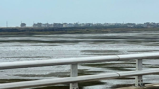 This picture was taken from the Jug Handle Bridge looking toward Rodanthe this morning. This indicates that water from Pamlico Sound is already being pushed toward the mainland.