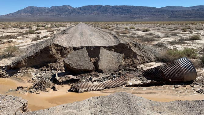 A culvert and section of Harry Wade Road were washed out due to flooding caused by the remnants of Hurricane Hilary.