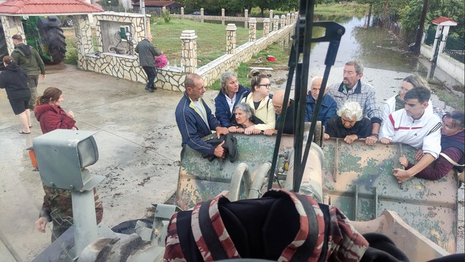 The Greek Army used a bulldozer to evacuate residents from heavily flooded areas in central Greece on Thursday, September 7, after torrential rain swamped the region.