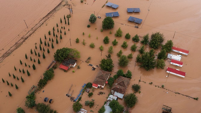 Buildings and trees submerged by floodwater following Storm Daniel in Trikala, Greece, on Thursday, Sept. 7, 2023.