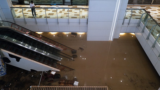 Floodwater in a shopping mall during heavy rain in Hong Kong, China, on Friday, Sept. 8, 2023.