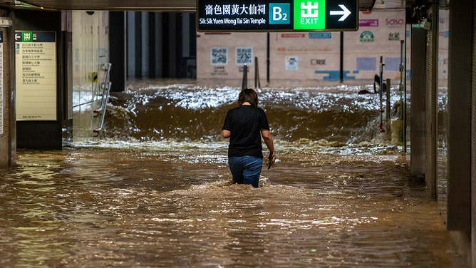 Record flooding strikes Hong Kong as deadly deluge injures over 140 ...