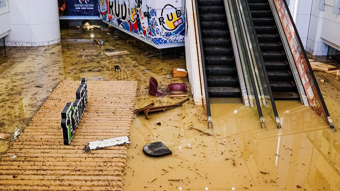 A shopping center is partially submerged after record-breaking rainfall on September 8, 2023 in Hong Kong, China.
