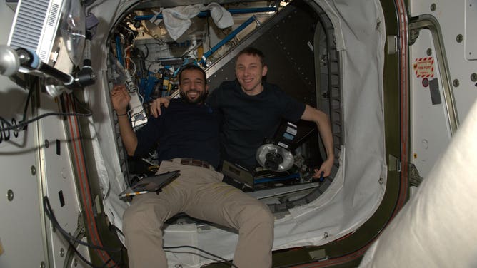 NASA astronaut Woody Hoburg and UAE astronaut Sultan Alnedayi on the International Space Station in July 2023.