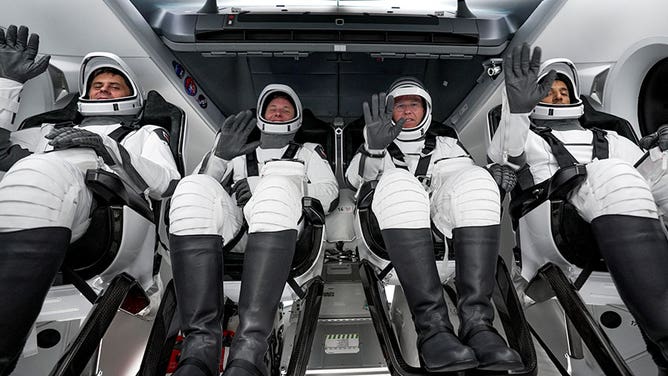 The four SpaceX Crew-6 members (from left) Andrey Fedyaev, Woody Hoburg, Stephen Bowen, and Sultan Alnedayi, are pictured inside the SpaceX Dragon Endeavour prior to launching in March.
