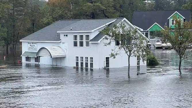 Southern East Coast hit by flooding as Ophelia weakens to tropical