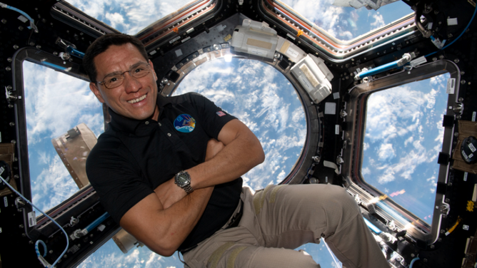 NASA astronaut Frank Rubio floats inside the cupola, the International Space Station’s 
