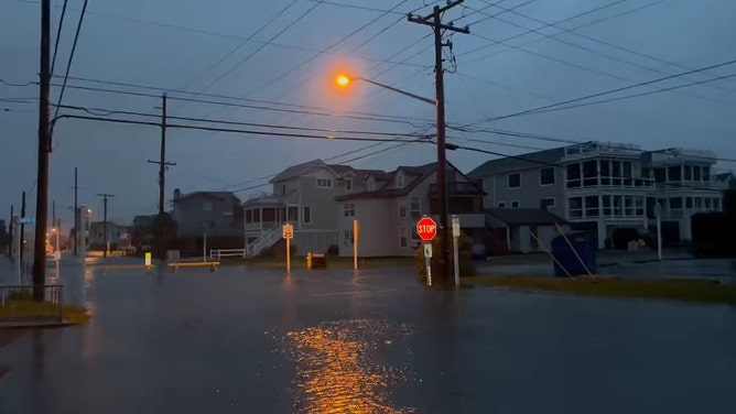 Coastal flooding seen on North Pennsylvania Avenue in Bethany Beach, Delaware, on Saturday.