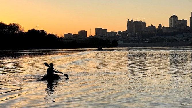 Steve Kueny, a competitive pumpkin farmer from Lebanon, Missouri, will break a Guinness World Record by paddling 39.17 miles in a 1,280-pound pumpkin named Huckle Berry.