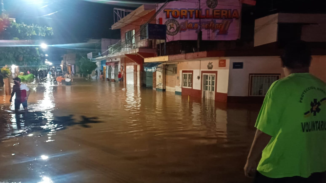 Several streets were flooded in Cihuatlan, Mexico, after the Marabasco River overflowed during Hurricane Lidia.