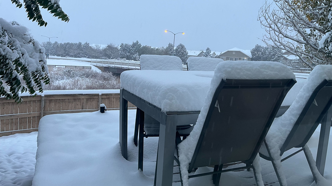 Several inches of snow can be seen covering a table in the Denver area on Sunday, October 29, 2023.