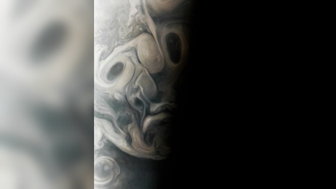 Juno mission's view of Jupiter's swirling clouds during its 54th close flyby of the planet.