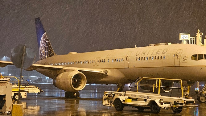 Snow arrived at Denver International Airport on Saturday morning.