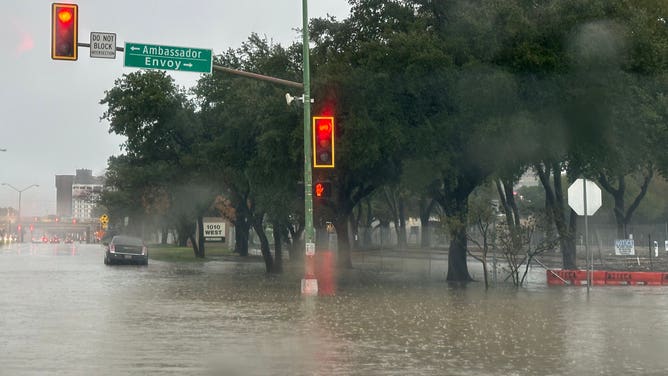 Street flooding in Dallas with one car stalled. Oct. 28, 2023.