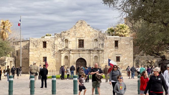 File photo: Tourists gather in front of the chapel of the Alamo Mission, known as the "Shrine of Texas Liberty", in downtown San Antonio Texas, on January 23, 2023. 